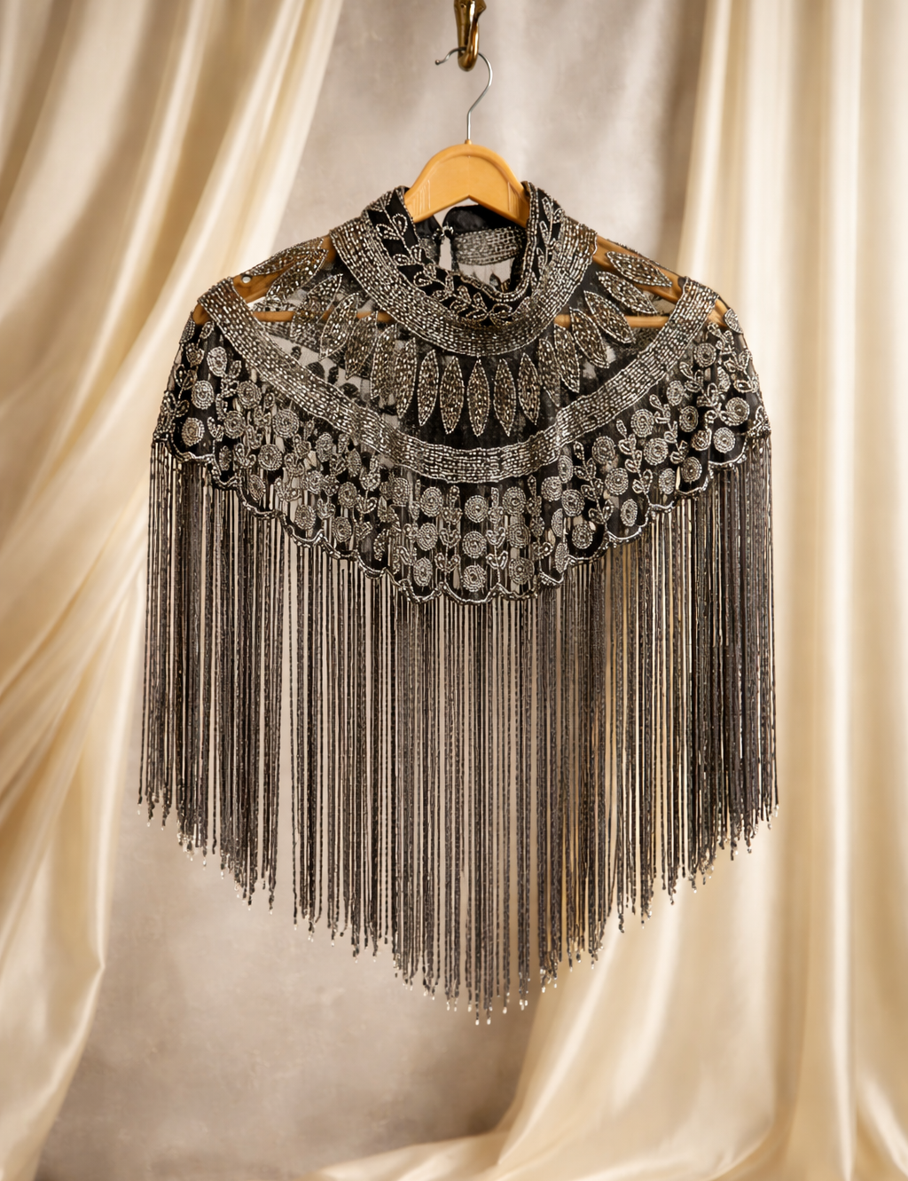 The Royale Noir Bisou Beaded Tassel Cape