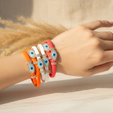 Double Evil Eye Adjustable Wrap Bracelet-Necklace Choker with Swarovski Crystals - Bansri Mehta Design
